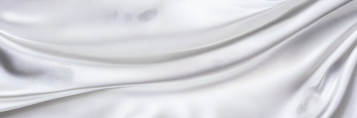 White gray satin texture that is white silver fabric silk panorama background with beautiful soft blur pattern natural.