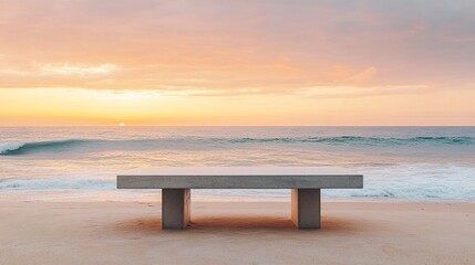 Minimalist concrete table on golden sandy beach, soft ocean waves in the background, pastel sunset hues, wide-angle capturing serene coastal simplicity.  