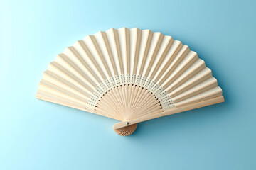 Open fan with wooden base on light blue background. Generated by artificial intelligence