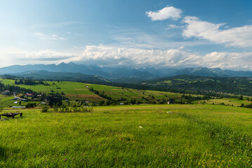 Obraz premium Tatra mountains from Sarnowska Grapa hill above Jurgow vilage in Poland