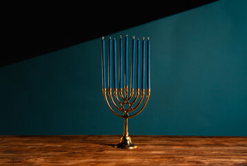 Elegant Menorah with Blue Candles on Wooden Surface