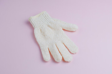 Coffee body scrub with coffee beans and anti-cellulite brush.