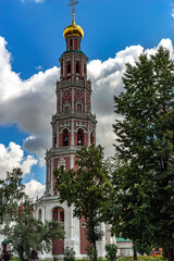 Fototapeta premium Bell tower of Novodevichy monastery in Moscow, Russia. Years of construction 1686 - 1688