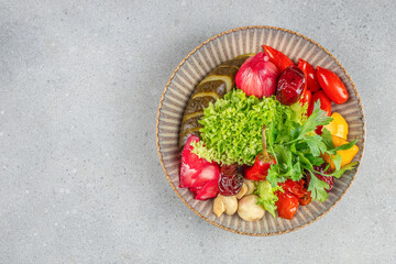 Assorted of fermented vegetables on plate. probiotics food for healthy lifestyle. mixed pickled vegetables, top view. copy space
