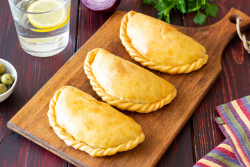 Baked empanadas. Latin American cuisine. Recipe. Fast food.