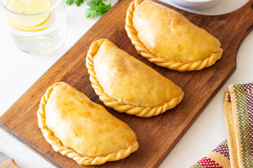 Baked empanadas. Latin American cuisine. Recipe. Fast food.