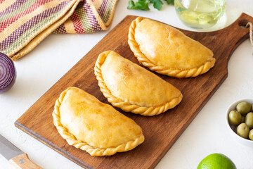 Baked empanadas. Latin American cuisine. Recipe. Fast food.