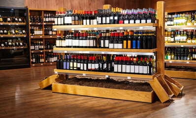 Wine bottles on retail display in liquor store