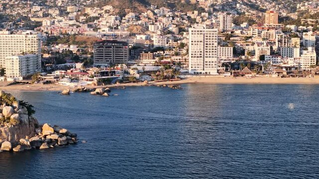 Shot of Acapulco at sunset with hurricane destruction