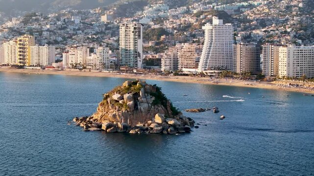 Rotational aerial shot and Acapulco beach