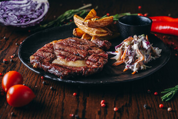 Grilled Steak on black Plate