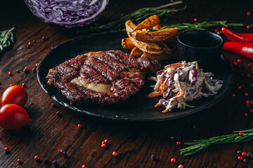 Grilled Steak on black Plate