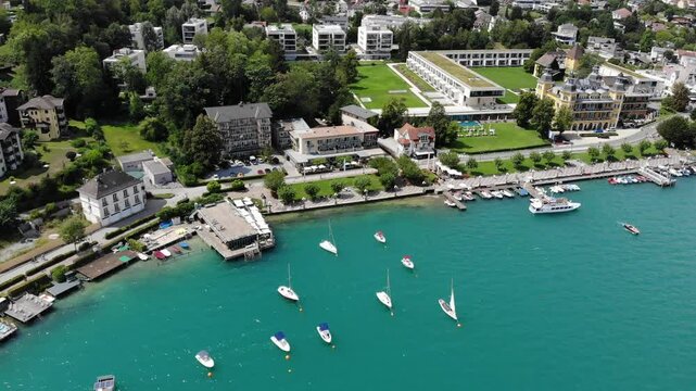 Worthersee mountain lake in Austrian Alps. Austria landscape in State of Carinthia. Town of Velden am Worther See. Drone point of view.