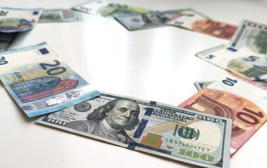 Multi currency note, bank bills and coins indicate world economy during war crisis. Money relate to all circumstances in the world events including stock exchange and fair trade link between countries