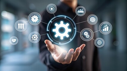 Automatic control system with modern technology for business management, businessman hand touching gears icon showing automation software operation