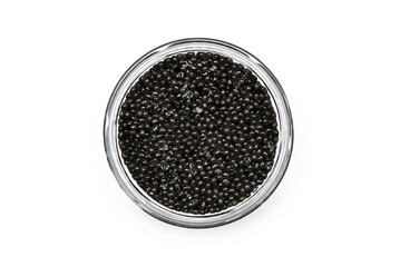 Black caviar in glass jar top view isolated on white background. Sea food, delicacy, small sturgeon caviar
