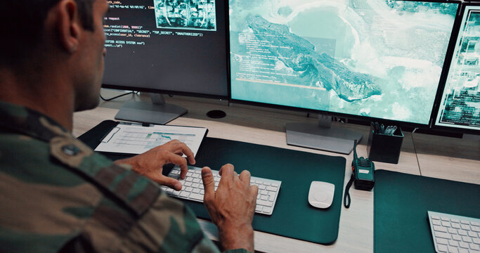 Man, army and typing with computer screen in control room, military battle and monitoring war. Soldier, feedback and global surveillance of satellite warning, government protection and secret service - Powered by Adobe