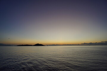 A stunning orange sunset over the calm Indian Ocean, Africa