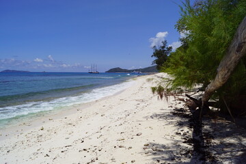 Sailing around tropical paradise islands in the Saint Anne Marine National Park, Seychelles, Africa