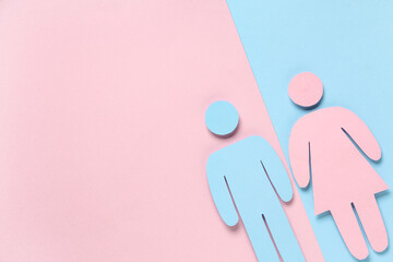 Male and female paper figures on color background
