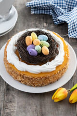 Homemade Easter egg cake on wooden table