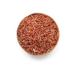 Bowl with raw brown rice on white background