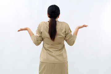 Back view of woman confusing. Young shocked woman with hands up. Isolated on white background....