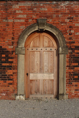 old wooden door in a stone wall