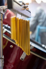 Close-up of tubullar bells in a orchestra