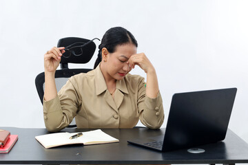 Stressed tired asian civil servant female at office. Isolated on white background