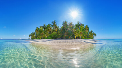 Palm trees and clean, transparent turquoise water on the Beautiful maldives tropical island -...