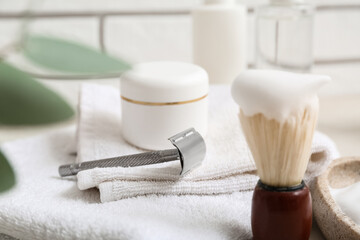 Set of men's shaving accessories on table, closeup