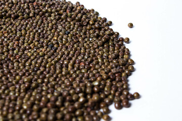 Organic Black Peas isolated on a white background. Black-eyed peas also called parched peas or dapple peas or Kala Vatana Desi Black Peas.