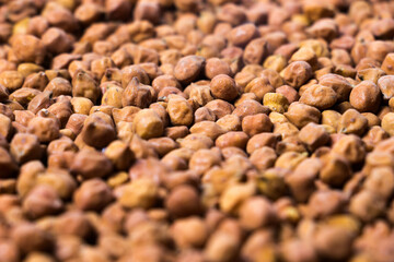 Closeup shot of Organic Brown Chickpeas. Black chickpeas, also known as kala chana, Bengal gram,Egyptian pea.