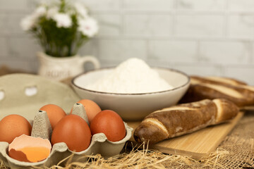 Freshly baked bread, flour, eggs. The process of baking bread.Baking Ingredients