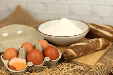 Freshly baked bread, flour, eggs. The process of baking bread.Baking Ingredients