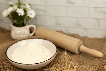 Baking utensils, flour and rolling pin. Flour. Preparation for baking