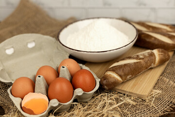 Freshly baked bread, flour, eggs. The process of baking bread.Baking Ingredients