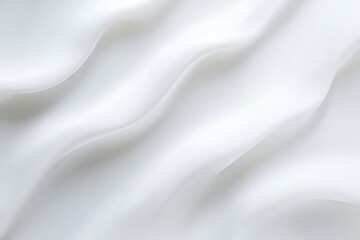 Obraz premium A soft, undulating white fabric with smooth waves, creating a gentle and tranquil visual effect.