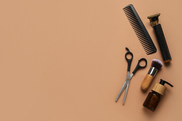 Modern trimmer and male shaving accessories on brown background