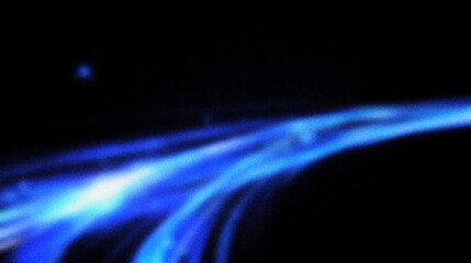 Grain noise texture Swirling blue nebula against a black space backdrop in a blurry display