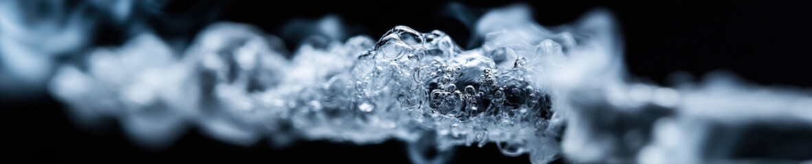 Water Stream with Bubbles and Vapor