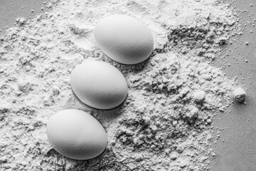 Egg and flour on white background