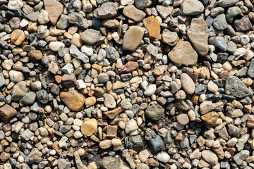 Colorful natural gravel stones texture background
