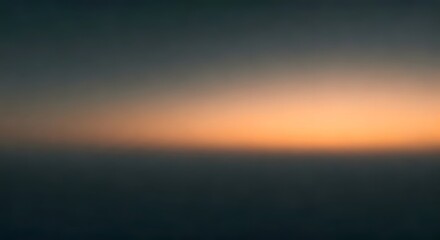 Obraz premium A silent, misty void with a soft gradient of charcoal gray to subtle sunrise orange, Ai Generated