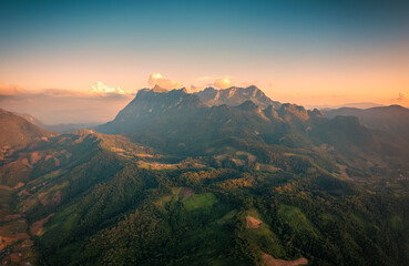 Doi Luang Chiang Dao limestone mountain wildlife sanctuary over local village on mountain in the evening