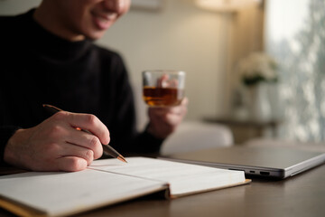 Creative thinking and relaxation: Writing ideas with a cup of tea.