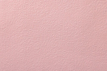 ピンク色の和紙のテクスチャーの背景素材　Japanese pink washi paper texture background