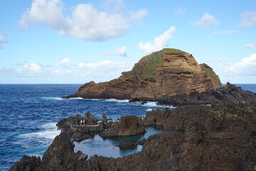 In Porto Moniz, Madeira, natural pools formed by volcanic rocks offer a unique oceanfront experience