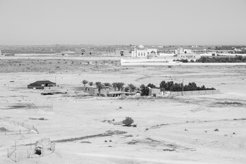 View of the small village Raghba with a mosque in the middle of the desert in Saudi Arabia